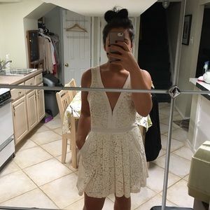 Fit and flare lace with open back